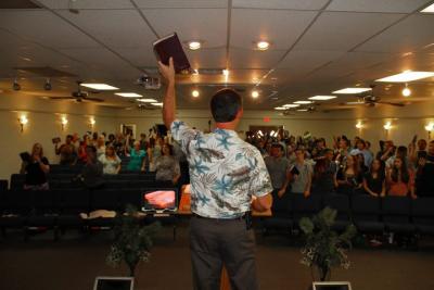 We begin our messages by standing in honor of God's Word.