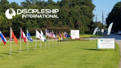 Trickum Middle School Entrance with Discipleship International Flags