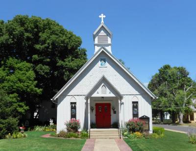 The Little White Church with the Red Doors