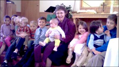 Pastor Carren & children of church