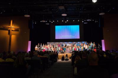 RidgeKids leading worship on Sunday Morning