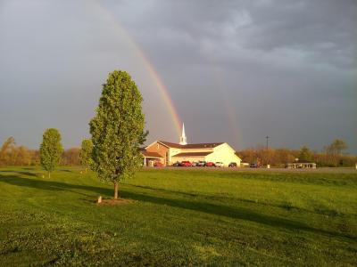 Double rainbow taken after a storm over our church